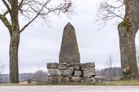 An old milestone in granit stone  with text 1781 스톡 사진