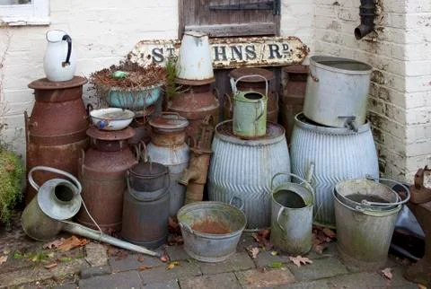 Old milk churns Stock Photos