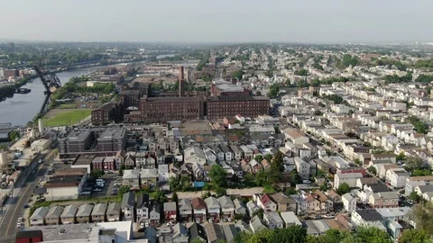 Old mill and packed rooftops beside the Passaic River Stockbeeldmateriaal 108296754
