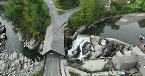 An Old Mill Building and DamCovered Bridge Stream Drone Aerial Quechee Vermont Stock Footage 277122133