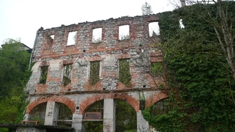 An old mill destroyed in a fire. Only the walls remained Stock Footage 154744976