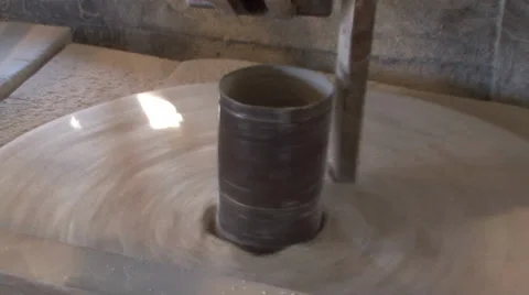 Old millstone grinds flour Stock Footage 35956490