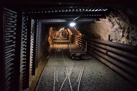 Old mining carts with wheels on rail for the transportation of minerals, Hara Stock Photos
