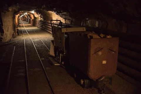 Old mining carts with wheels on rail for the transportation of minerals, Hara Stock Photos