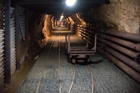 Old mining carts with wheels on rail for the transportation of minerals, Hara 스톡 사진