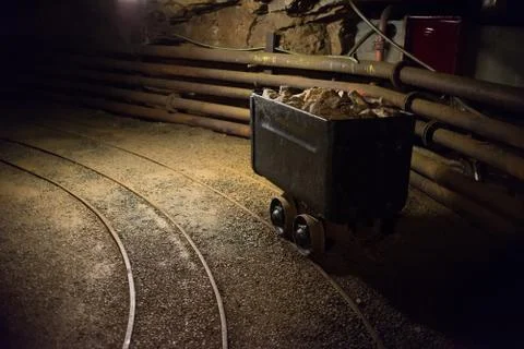 Old mining carts with wheels on rail for the transportation of minerals, Hara Stock Photos