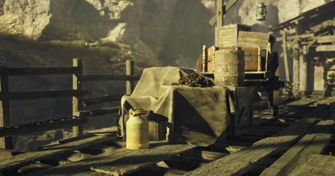 Old mining equipment and tools on weathered wooden dock in deserted canyon Stock Footage 327202181