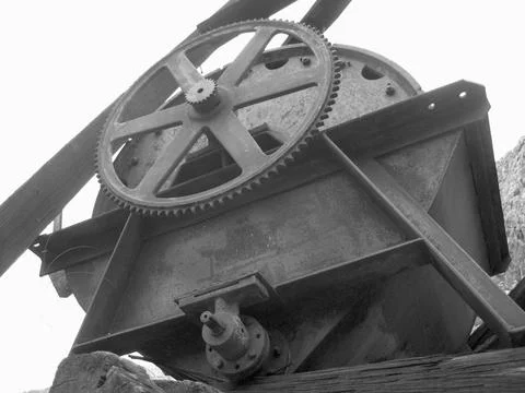 Old Mining Machine at Abandoned Mine Site, Black and White Stock Photos