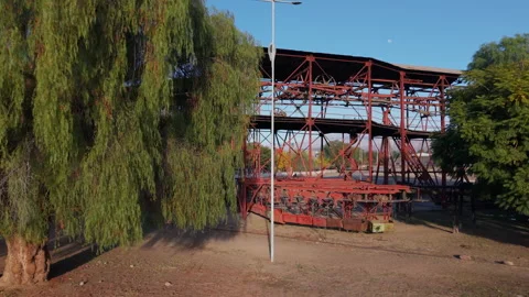 Old mining structures of Estación 1 Cable Carril among trees and mountains in Stock Footage 321735046