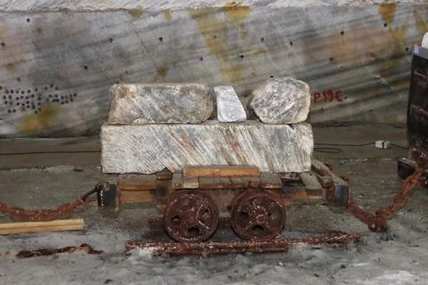 Old mining wagons inside the public Salt Mine at Slanic Prahova, Romania Stock Photos