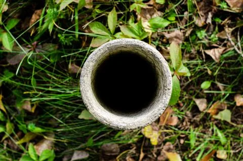 Old mining water pipe Old wastewater or pipe in the countryside Stock Photos
