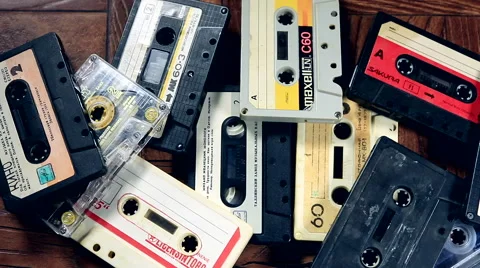 Old mixed tape found amongst a pile of audio cassettes Stock Footage
