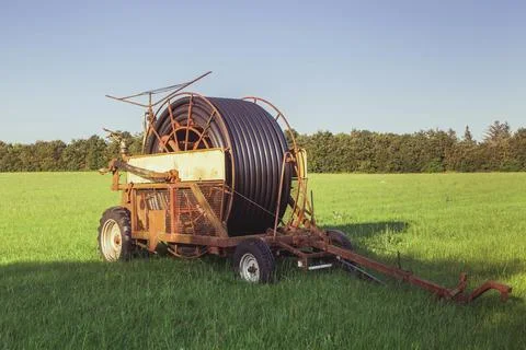 Old mobile machine for irrigation of fields Stock Photos