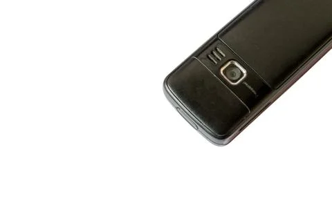 Old mobile phone back isolated white background Stock Photos