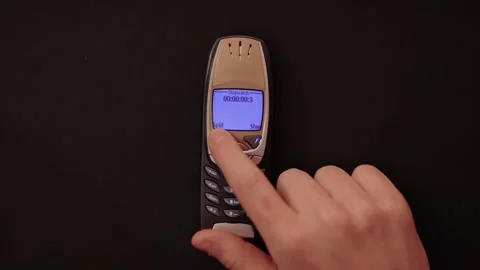 Old Mobile Phone stopwatch function started Stock Footage 242996330