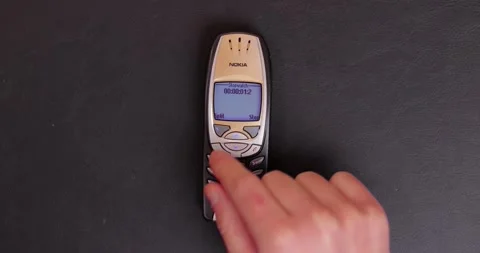 Old Mobile Phone stopwatch function started Stock Footage 253128344