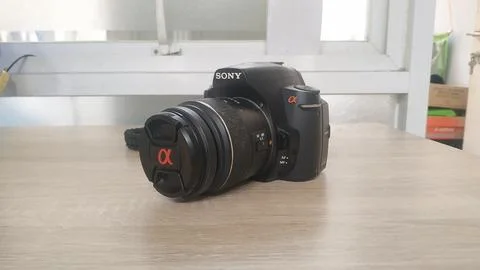 Old model sony digital camera,on the wood background Stock Photos