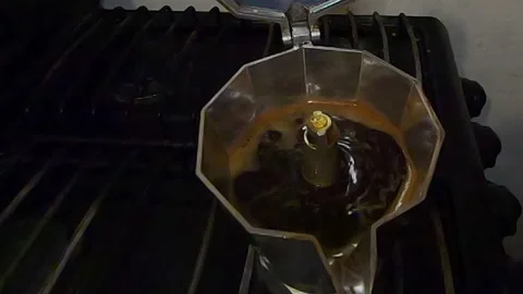 Old moka pot brewing coffee Stock Footage 159565656