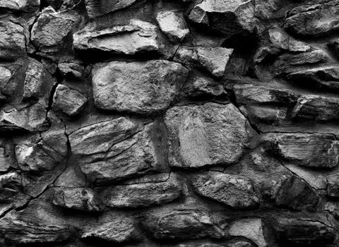 Old monastery wall made of big rocks b&amp;w 3d texture, background Stock Photos