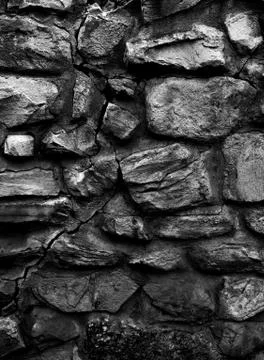 Old monastery wall made of big rocks b&amp;w vertical 3d texture, background Stock Photos