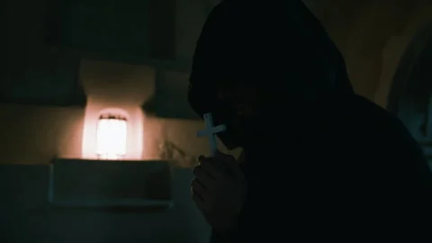 Old Monk Praying With Crucifix In The Dark Church Stock Footage 301930033