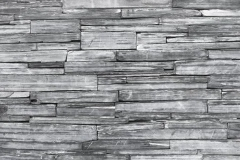 Old monochrome modern pattern of stone wall decorative surfaces Stock Photos