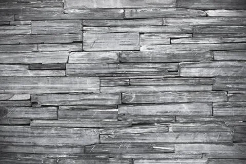 Old monochrome modern pattern of stone wall decorative surfaces Stock Photos