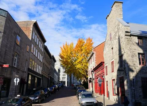 Old Montreal, Canada - October 27, 2019 - The view of the street, stores, res Stock Photos