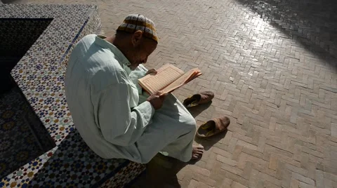 An old Moroccan man reciting Coran Stock Footage 49570454