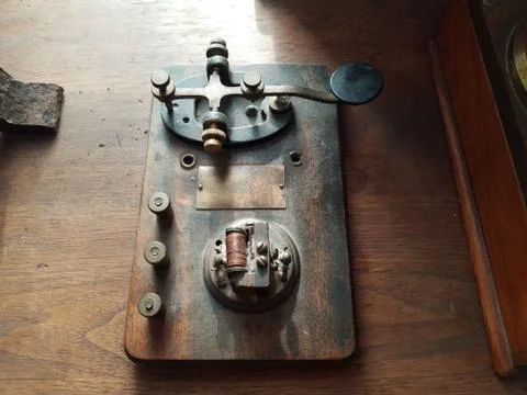 Old Morse code or telegraph key with copper wire 스톡 사진