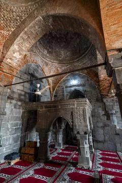 Old mosque structure in Paharpur showcases intricate stonework and historical Stock Photos