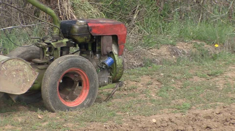 Old motor hoe in field Stock Footage 38296637