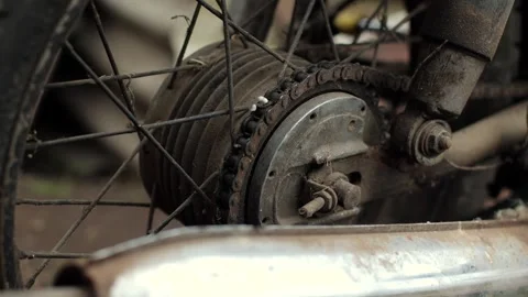 Old motorcycle in the dust. Red retro moto. Defective motorcycle, needs repair Stock Footage 269701192