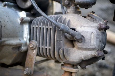Old motorcycle engine block looks dull with a place for spark plugs Stock Photos