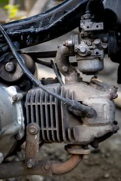 Old motorcycle engine block looks dull with a place for spark plugs Stock Photos