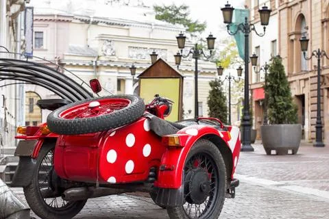 Old motorcycle with red dots Stock Photos