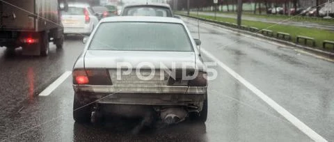 Old muddy sedan Stock Photos