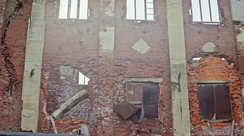Old multi-storey building of brick in a state of devastation and breaking down Stock Footage 68288146