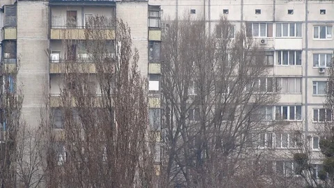 Old multi-storey house in kiev on the background of bare trees Stock Footage 74115268