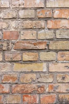 Old multicolor brick wall wallpaper Stock Photos