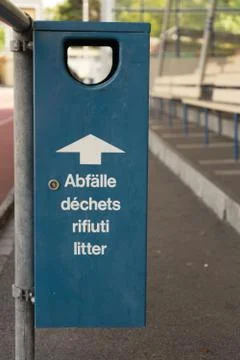 Old multilangual garbage bin Stock Photos