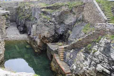 Old natural pool for breeding shellfish in Rinlo town, a small fishing vill.. Stock Photos