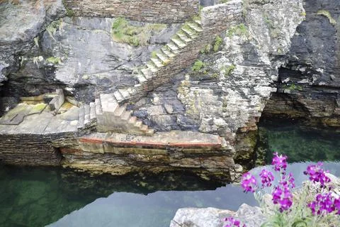Old natural pool for breeding shellfish in Rinlo town, a small fishing vill.. Stock Photos