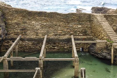 Old natural pool for breeding shellfish in Rinlo town, a small fishing vill.. Stock Photos