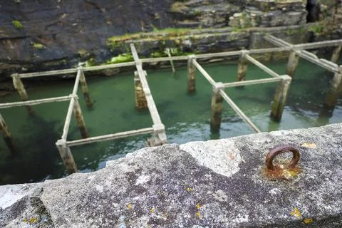 Old natural pool for breeding shellfish in Rinlo town, a small fishing vill.. Stock Photos