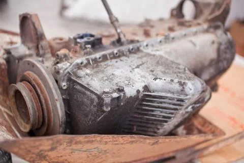 Old not working engine lies in the wheelbarrow Stock Photos