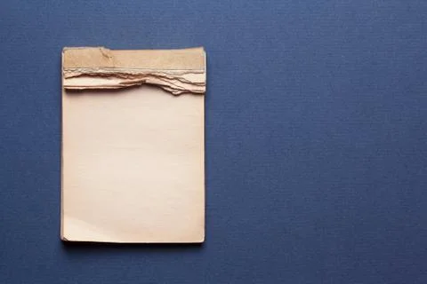 Old notebook on gray background Stock Photos