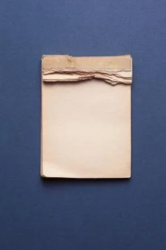 Old notebook on gray background Stock Photos