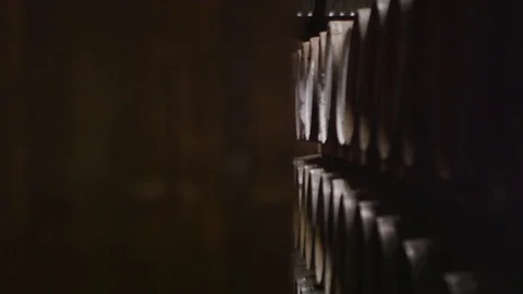Old oak barrels in a row at the cellars of the winery 스톡 동영상 81540180