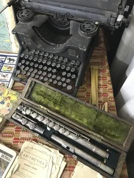 Old objects displayed on the table Stock Photos